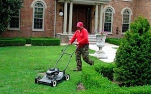 SAB Landscape Tree Service Mowing a Lawn