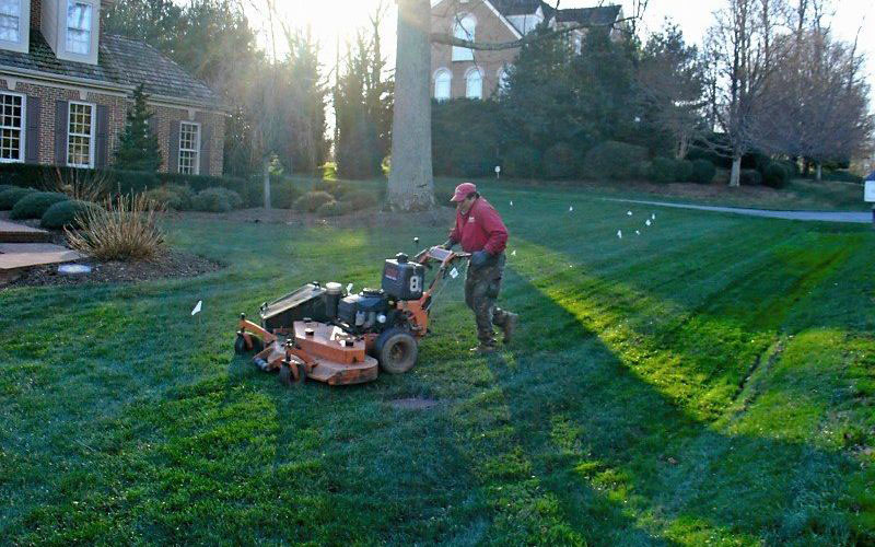 SAB Lawn & Landscaping mowing a large lawn